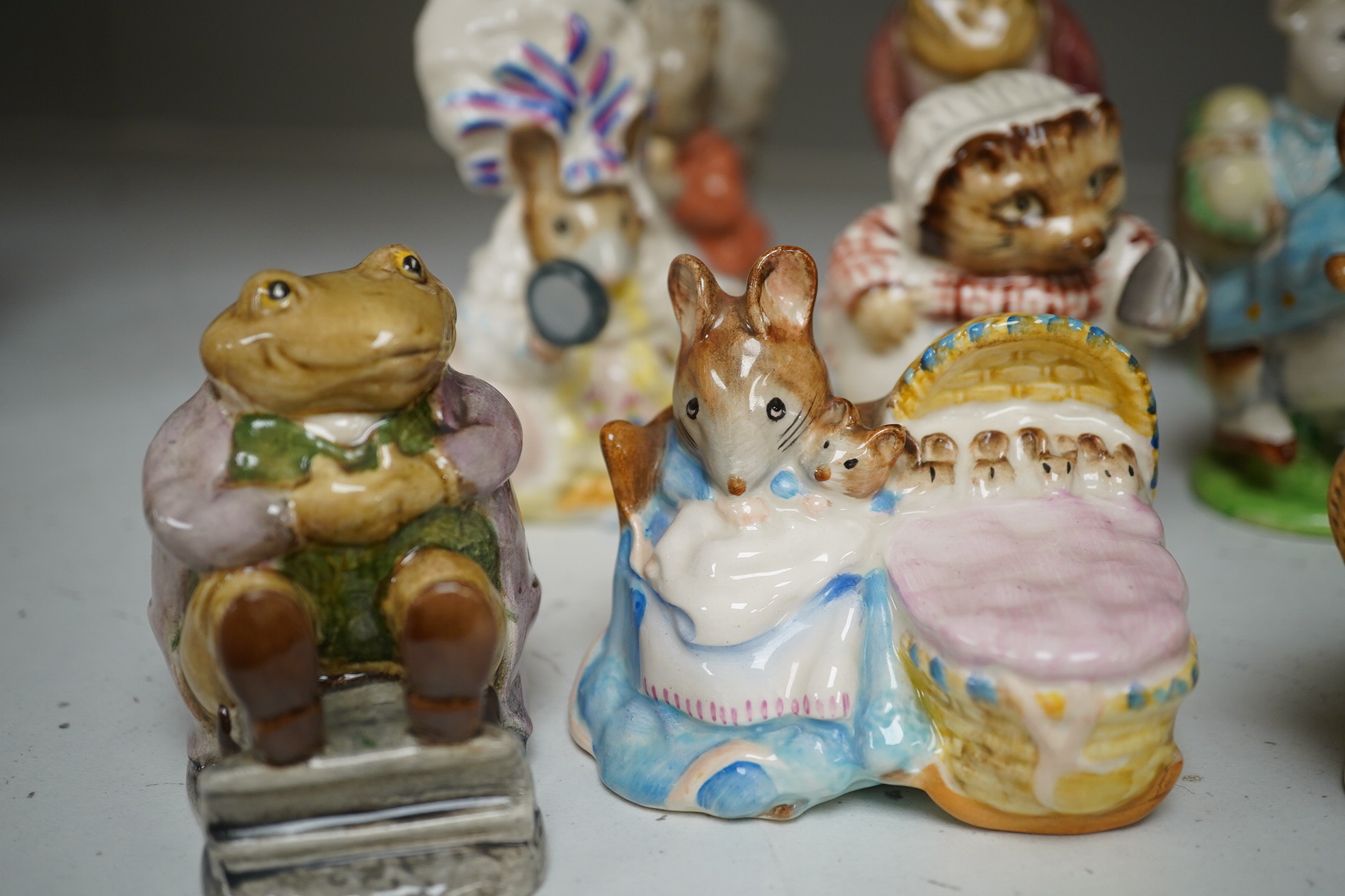 A collection of nineteen Beswick ‘Beatrix Potter’ figures, tallest Foxy Whiskered Gentleman, 12cm high. Condition - fair to good